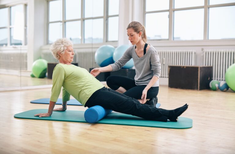 Two women doing corrective exercise